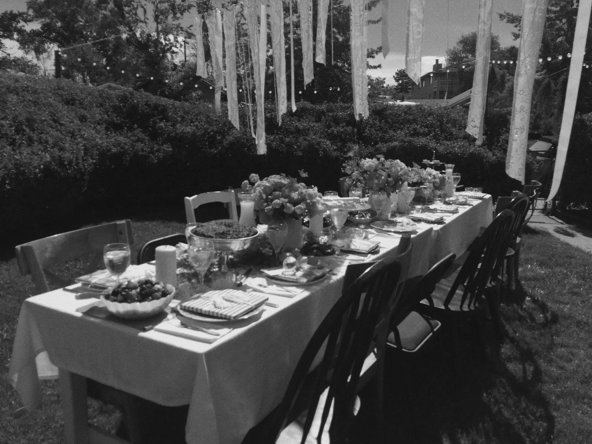 Outdoor long table with tassel garland